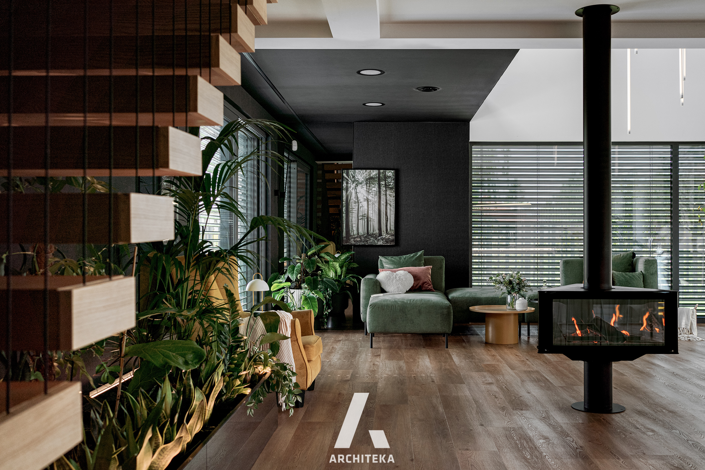Salon domu premium w Szczecinie z wolnostojącym kominkiem, projekt ARCHITEKA